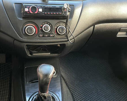 Черный Мицубиси Лансер, объемом двигателя 1.6 л и пробегом 200 тыс. км за 3000 $, фото 10 на Automoto.ua