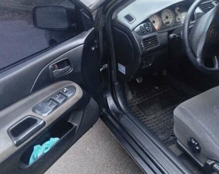 Чорний Міцубісі Lancer, об'ємом двигуна 1.6 л та пробігом 211 тис. км за 3700 $, фото 2 на Automoto.ua