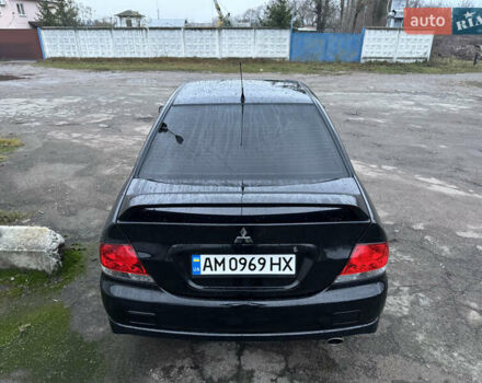 Черный Мицубиси Лансер, объемом двигателя 1.58 л и пробегом 154 тыс. км за 5500 $, фото 11 на Automoto.ua