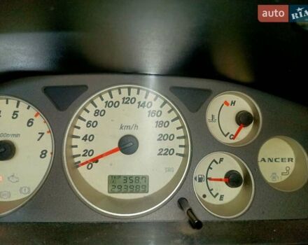 Чорний Міцубісі Lancer, об'ємом двигуна 1.58 л та пробігом 294 тис. км за 3800 $, фото 8 на Automoto.ua