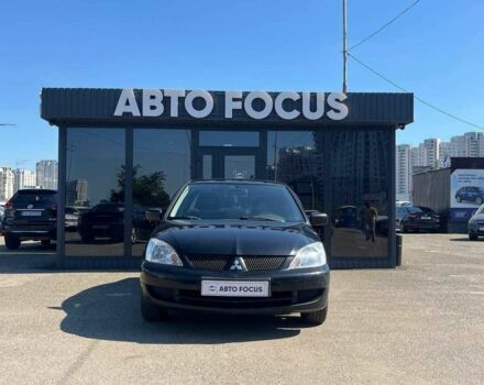Чорний Міцубісі Lancer, об'ємом двигуна 2 л та пробігом 310 тис. км за 4990 $, фото 2 на Automoto.ua