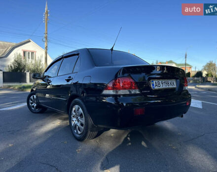 Мицубиси Лансер 2005 в Виннице на Automoto.ua Черный Мицубиси Лансер, объемом двигателя 1.6 л и пробегом 261 тыс. км за 4100 $, фото 22 на Automoto.ua