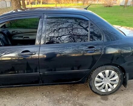 Чорний Міцубісі Lancer, об'ємом двигуна 1.6 л та пробігом 260 тис. км за 3900 $, фото 3 на Automoto.ua