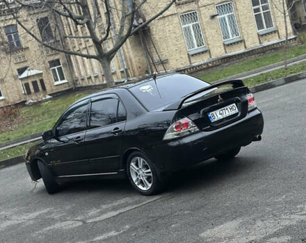 Чорний Міцубісі Lancer, об'ємом двигуна 2 л та пробігом 250 тис. км за 3999 $, фото 4 на Automoto.ua