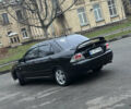 Чорний Міцубісі Lancer, об'ємом двигуна 2 л та пробігом 250 тис. км за 3999 $, фото 4 на Automoto.ua