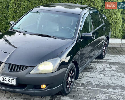 Мицубиси Лансер 2005 в Черкассах на Automoto.ua Черный Мицубиси Лансер, объемом двигателя 1.58 л и пробегом 368 тыс. км за 4400 $, фото 12 на Automoto.ua