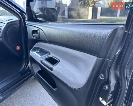 Мицубиси Лансер 2005 в Виннице на Automoto.ua Черный Мицубиси Лансер, объемом двигателя 1.6 л и пробегом 261 тыс. км за 4100 $, фото 49 на Automoto.ua