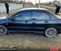Чорний Міцубісі Lancer, об'ємом двигуна 2 л та пробігом 485 тис. км за 4500 $, фото 9 на Automoto.ua
