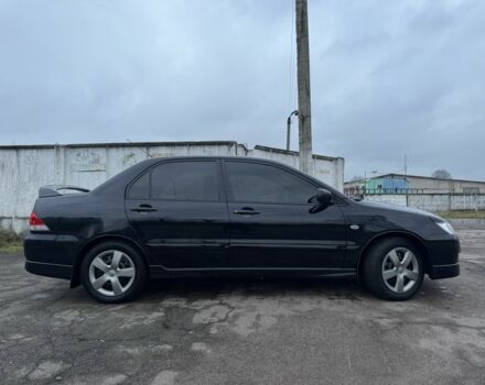 Чорний Міцубісі Lancer, об'ємом двигуна 1.6 л та пробігом 154 тис. км за 5500 $, фото 5 на Automoto.ua