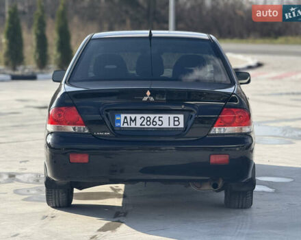 Чорний Міцубісі Lancer, об'ємом двигуна 1.6 л та пробігом 205 тис. км за 3650 $, фото 2 на Automoto.ua