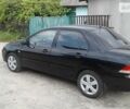 Чорний Міцубісі Lancer, об'ємом двигуна 1.6 л та пробігом 13 тис. км за 10000 $, фото 1 на Automoto.ua