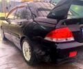 Чорний Міцубісі Lancer, об'ємом двигуна 1.6 л та пробігом 200 тис. км за 4000 $, фото 1 на Automoto.ua