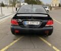 Черный Мицубиси Лансер, объемом двигателя 1.6 л и пробегом 350 тыс. км за 2900 $, фото 5 на Automoto.ua