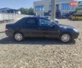 Чорний Міцубісі Lancer, об'ємом двигуна 1.58 л та пробігом 206 тис. км за 3600 $, фото 1 на Automoto.ua
