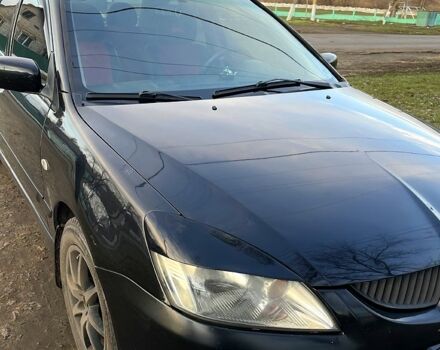 Чорний Міцубісі Lancer, об'ємом двигуна 2 л та пробігом 485 тис. км за 4500 $, фото 2 на Automoto.ua