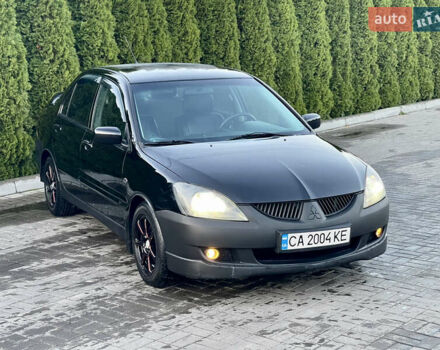Мицубиси Лансер 2005 в Черкассах на Automoto.ua Черный Мицубиси Лансер, объемом двигателя 1.58 л и пробегом 368 тыс. км за 4400 $, фото 10 на Automoto.ua