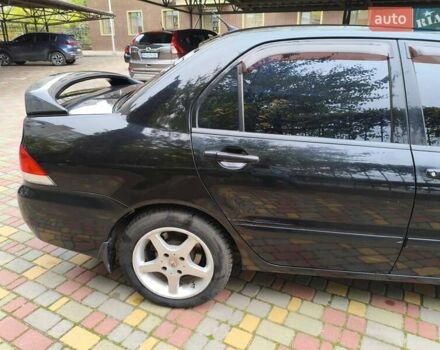 Мицубиси Лансер 2005 в Одессе на Automoto.ua Черный Мицубиси Лансер, объемом двигателя 1.58 л и пробегом 206 тыс. км за 3900 $, фото 5 на Automoto.ua