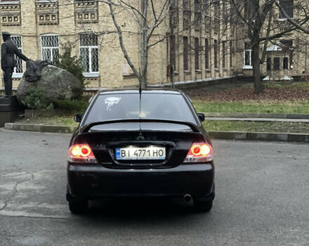Чорний Міцубісі Lancer, об'ємом двигуна 2 л та пробігом 250 тис. км за 3999 $, фото 6 на Automoto.ua