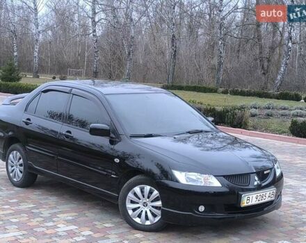 Чорний Міцубісі Lancer, об'ємом двигуна 1.58 л та пробігом 263 тис. км за 4500 $, фото 3 на Automoto.ua