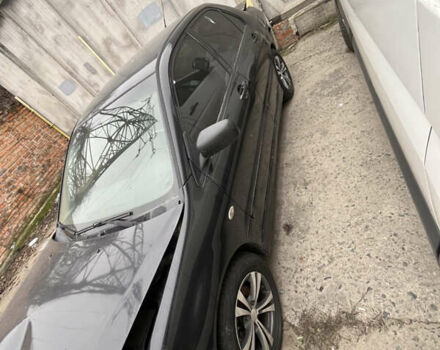 Черный Мицубиси Лансер, объемом двигателя 1.58 л и пробегом 360 тыс. км за 1500 $, фото 2 на Automoto.ua