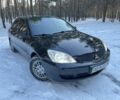 Черный Мицубиси Лансер, объемом двигателя 1.6 л и пробегом 250 тыс. км за 4299 $, фото 1 на Automoto.ua