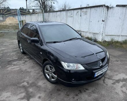 Чорний Міцубісі Lancer, об'ємом двигуна 1.6 л та пробігом 154 тис. км за 5500 $, фото 1 на Automoto.ua