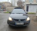 Черный Мицубиси Лансер, объемом двигателя 2 л и пробегом 275 тыс. км за 2599 $, фото 3 на Automoto.ua