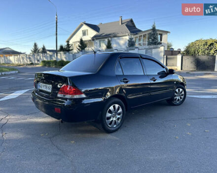 Мицубиси Лансер 2005 в Виннице на Automoto.ua Черный Мицубиси Лансер, объемом двигателя 1.6 л и пробегом 261 тыс. км за 4100 $, фото 11 на Automoto.ua