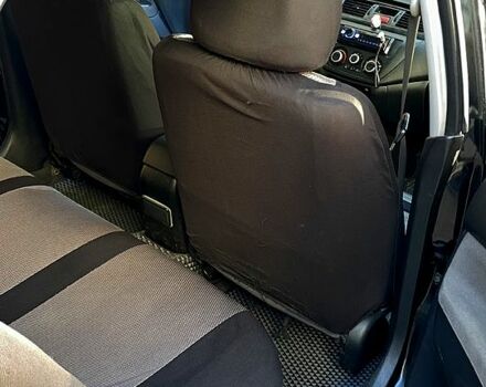 Черный Мицубиси Лансер, объемом двигателя 1.6 л и пробегом 200 тыс. км за 3000 $, фото 5 на Automoto.ua