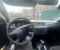Чорний Міцубісі Lancer, об'ємом двигуна 1.58 л та пробігом 279 тис. км за 4000 $, фото 7 на Automoto.ua