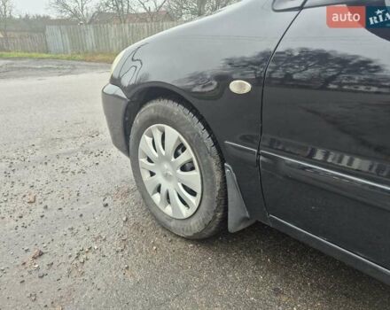 Черный Мицубиси Лансер, объемом двигателя 1.58 л и пробегом 280 тыс. км за 3200 $, фото 9 на Automoto.ua