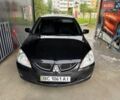 Черный Мицубиси Лансер, объемом двигателя 1.58 л и пробегом 249 тыс. км за 5000 $, фото 8 на Automoto.ua