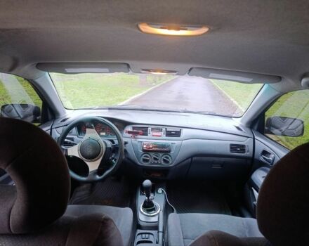 Черный Мицубиси Лансер, объемом двигателя 2 л и пробегом 275 тыс. км за 2599 $, фото 4 на Automoto.ua