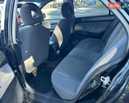 Мицубиси Лансер 2005 в Виннице на Automoto.ua Черный Мицубиси Лансер, объемом двигателя 1.6 л и пробегом 261 тыс. км за 4100 $, фото 39 на Automoto.ua