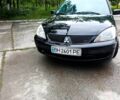 Черный Мицубиси Лансер, объемом двигателя 1.6 л и пробегом 320 тыс. км за 3900 $, фото 1 на Automoto.ua