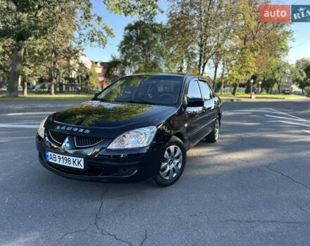 Мицубиси Лансер 2005 в Виннице на Automoto.ua Черный Мицубиси Лансер, объемом двигателя 1.6 л и пробегом 261 тыс. км за 4100 $, фото 2 на Automoto.ua