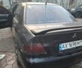 Чорний Міцубісі Lancer, об'ємом двигуна 1.6 л та пробігом 290 тис. км за 3800 $, фото 1 на Automoto.ua