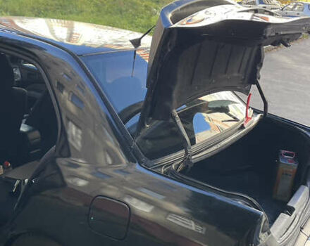 Черный Мицубиси Лансер, объемом двигателя 1.6 л и пробегом 200 тыс. км за 3000 $, фото 12 на Automoto.ua