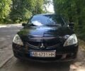 Черный Мицубиси Лансер, объемом двигателя 1.6 л и пробегом 270 тыс. км за 3800 $, фото 1 на Automoto.ua