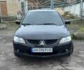 Чорний Міцубісі Lancer, об'ємом двигуна 1.6 л та пробігом 154 тис. км за 5500 $, фото 2 на Automoto.ua