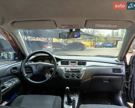 Мицубиси Лансер 2005 в Одессе на Automoto.ua Черный Мицубиси Лансер, объемом двигателя 1.58 л и пробегом 206 тыс. км за 3900 $, фото 15 на Automoto.ua