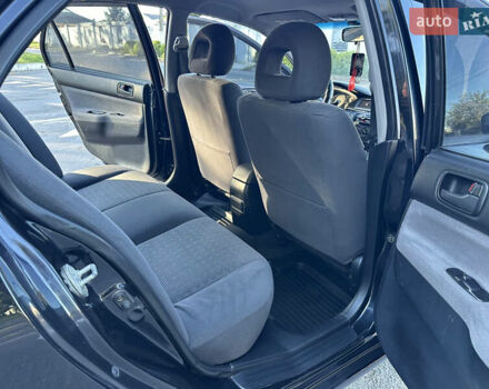 Мицубиси Лансер 2005 в Виннице на Automoto.ua Черный Мицубиси Лансер, объемом двигателя 1.6 л и пробегом 261 тыс. км за 4100 $, фото 44 на Automoto.ua