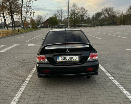 Черный Мицубиси Лансер, объемом двигателя 2 л и пробегом 270 тыс. км за 5200 $, фото 8 на Automoto.ua