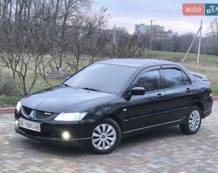 Чорний Міцубісі Lancer, об'ємом двигуна 1.58 л та пробігом 263 тис. км за 4500 $, фото 22 на Automoto.ua