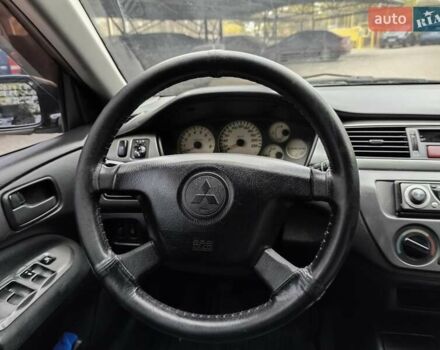 Мицубиси Лансер 2005 в Одессе на Automoto.ua Черный Мицубиси Лансер, объемом двигателя 1.58 л и пробегом 206 тыс. км за 3900 $, фото 18 на Automoto.ua