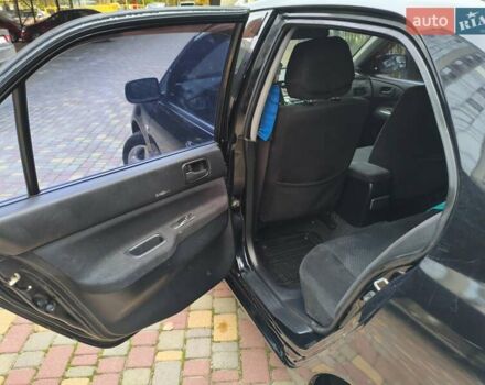 Мицубиси Лансер 2005 в Одессе на Automoto.ua Черный Мицубиси Лансер, объемом двигателя 1.58 л и пробегом 206 тыс. км за 3900 $, фото 14 на Automoto.ua