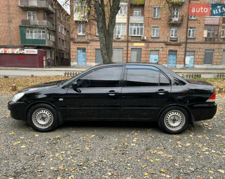 Черный Мицубиси Лансер, объемом двигателя 1.58 л и пробегом 341 тыс. км за 3950 $, фото 6 на Automoto.ua