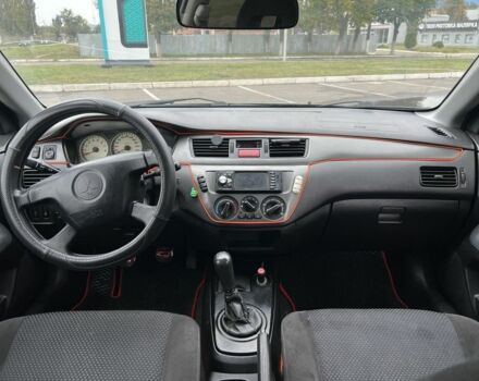 Черный Мицубиси Лансер, объемом двигателя 1.6 л и пробегом 390 тыс. км за 4000 $, фото 8 на Automoto.ua