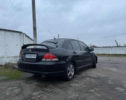 Чорний Міцубісі Lancer, об'ємом двигуна 1.6 л та пробігом 154 тис. км за 5500 $, фото 6 на Automoto.ua