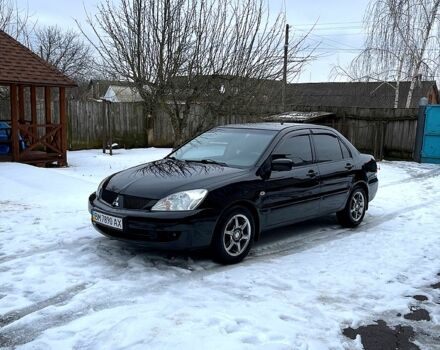 Чорний Міцубісі Lancer, об'ємом двигуна 1.6 л та пробігом 212 тис. км за 5200 $, фото 2 на Automoto.ua